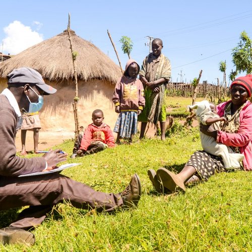 A census worker performs a health and wellness check with a family in Elgeyo Marakwet, Kenya.