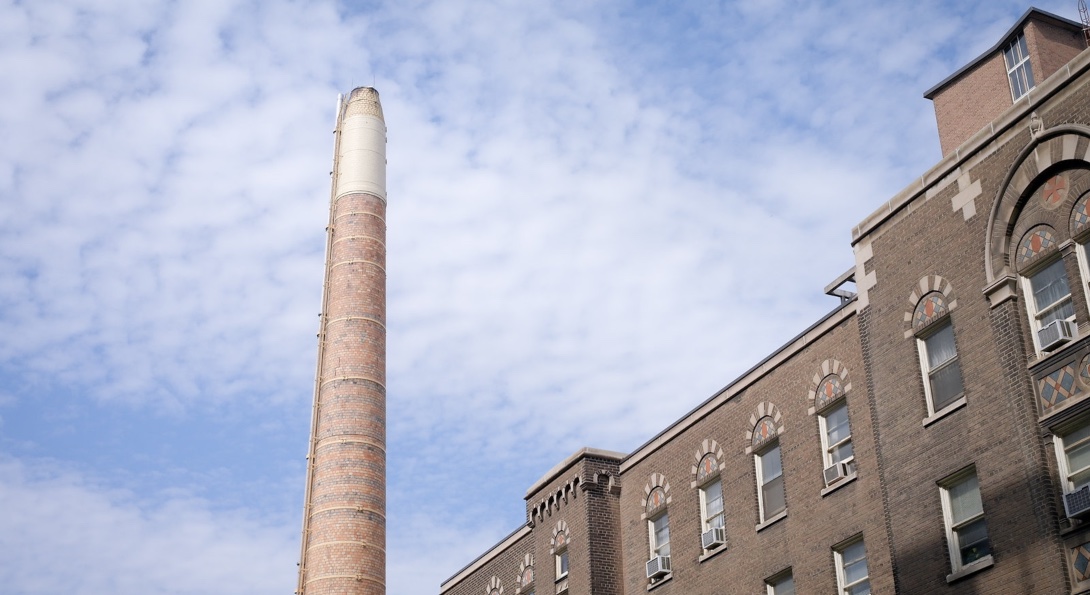 St. Joseph's Hospital in Ontario and a smokestack from its power generating plant.
