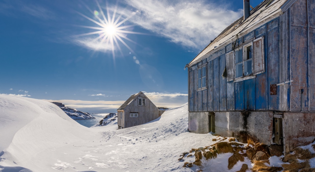 A small village in Greenland on a sunny day.